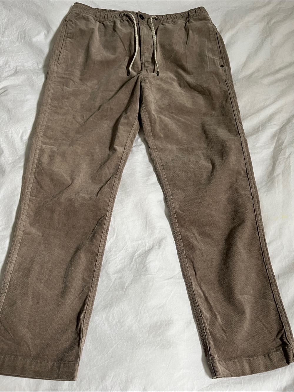 Vuori Men's Optimist Pant beige corduroy drawstring elastic waist minimalist
